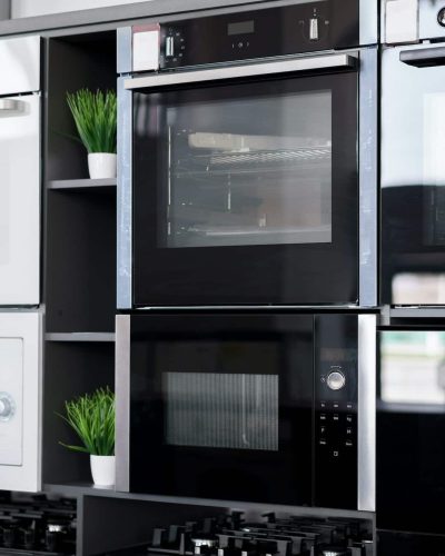 Electrical ovens, home appliances in the store